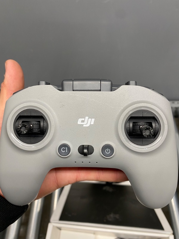 Photo 7 of **PREVIOUSLY USED, DO NOT KNOW IF PARTS ARE MISSING, UNABLE TO TEST FUNCTIONALITY** 
DJI FPV Combo - First-Person View Drone UAV Quadcopter with 4K Camera, S Flight Mode, Super-Wide 150° FOV, HD Low-Latency Transmission, Emergency Brake and Hover, Gray
