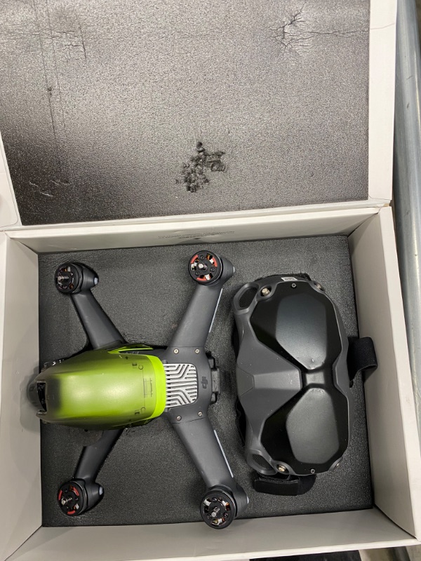 Photo 2 of **PREVIOUSLY USED, DO NOT KNOW IF PARTS ARE MISSING, UNABLE TO TEST FUNCTIONALITY** 
DJI FPV Combo - First-Person View Drone UAV Quadcopter with 4K Camera, S Flight Mode, Super-Wide 150° FOV, HD Low-Latency Transmission, Emergency Brake and Hover, Gray
