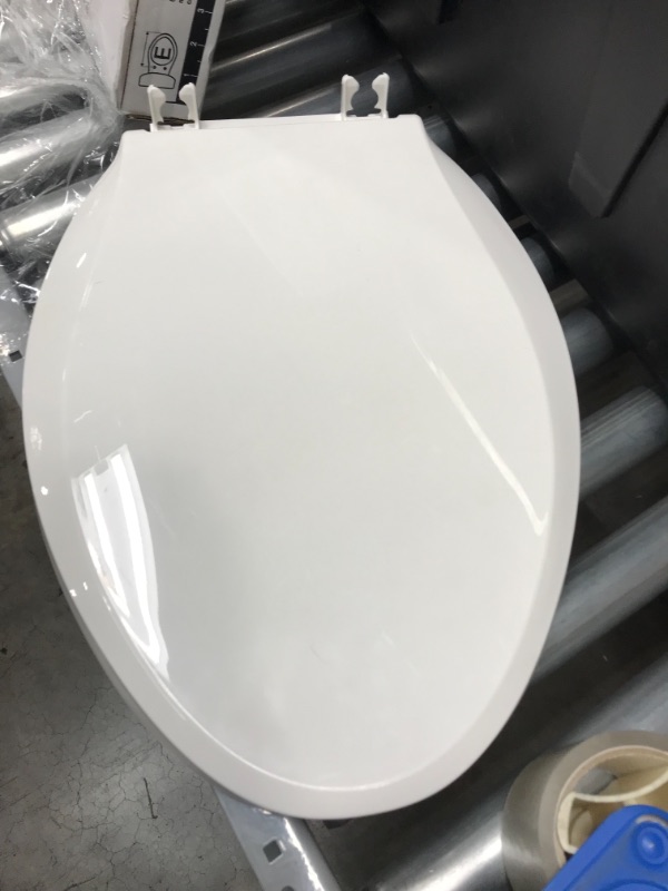 Photo 2 of *MISSING hardware cover pieces, SEE last picture* 
Kohler 4636-0 Cachet Quiet-Close with Grip-Tight Elongated Toilet Seat - White