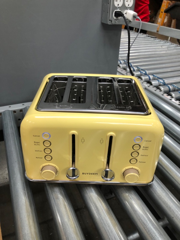 Photo 3 of **ONE TOAST HOLDER IS DAMAGED**
BUYDEEM DT-640 4-Slice Toaster, Extra Wide Slots, Retro Stainless Steel with High Lift Lever, Bagel and Muffin Function, Removal Crumb Tray, 7-Shade Settings (Mellow Yellow)
