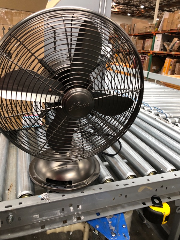 Photo 2 of **DOES NOT TURN ON**
HUNTER Retro Table Fan, 12", Onyx Copper
