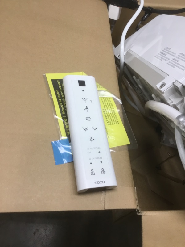 Photo 1 of TOTO SW3084#01 WASHLET C5 Electronic Bidet Toilet Seat with PREMIST and EWATER+ Wand Cleaning, Elongated, Cotton White
