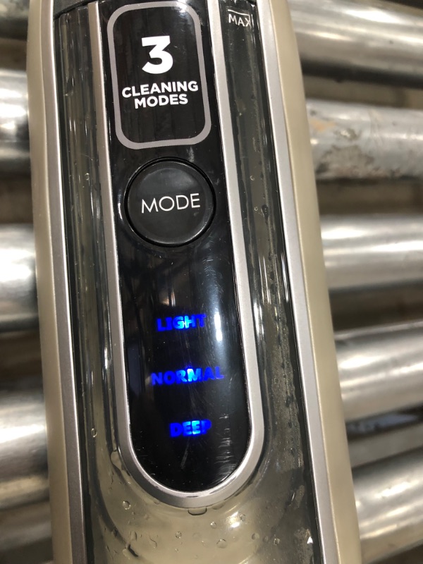 Photo 3 of Shark S7001 Mop, Scrub & Sanitize at The Same Time, Designed for Hard Floors, with 4 Dirt Grip Soft Scrub Washable Pads, 3 Steam Modes & LED Headlights, Gold, 13.7 in L x 6.75 in W x 46.5 in H
