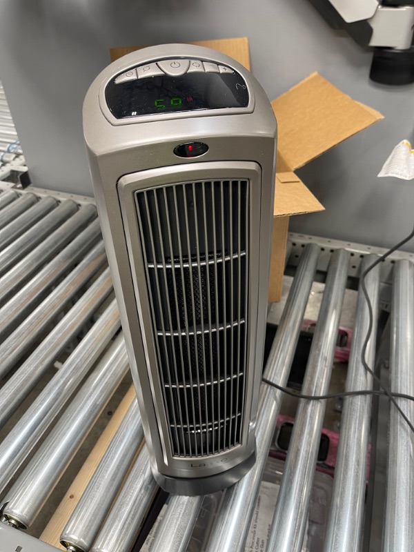 Photo 2 of Lasko 755320 Ceramic Space Tower Heater, 8.5?L x 7.25?W x 23?H, Silver

//POWERS ON
