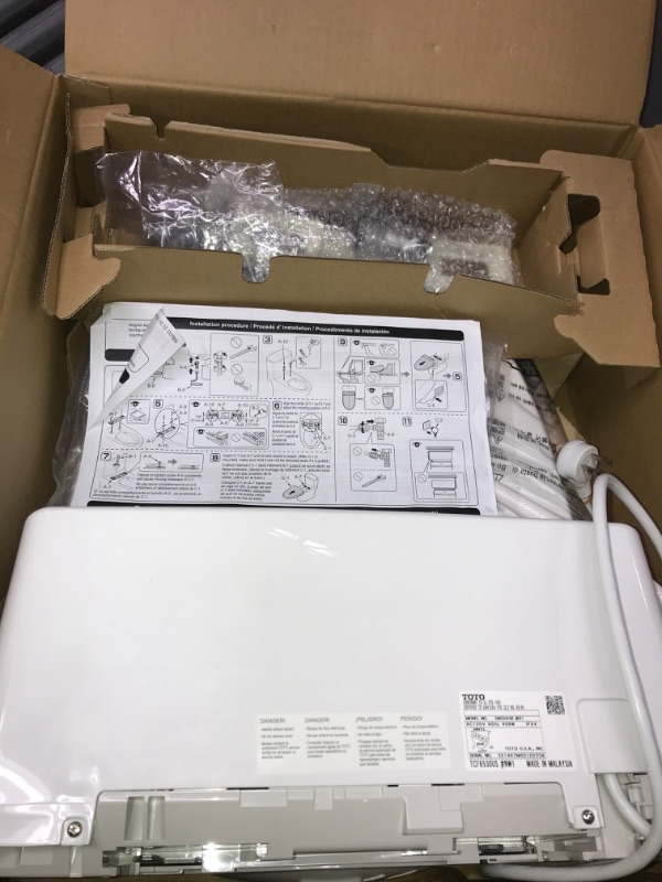 Photo 2 of TOTO SW2043R#01 C200 Electronic Bidet Toilet Cleansing Water, Heated Seat, Deodorizer, Warm Air Dryer, and PREMIST, Round, Cotton White