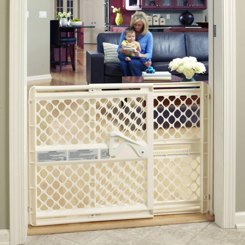 Photo 1 of Toddleroo by North States 42” Supergate Ergo Baby Gate Great for doorways or stairways, Includes Wall Cups for Extra Holding Power, Pressure or Hardware Mount, 26” - 42” Wide, 26" Tall, Ivory