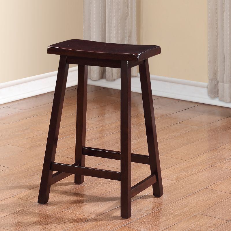 Photo 1 of 24 Inch Wooden Saddle Stool with Slanted Legs, Brown
