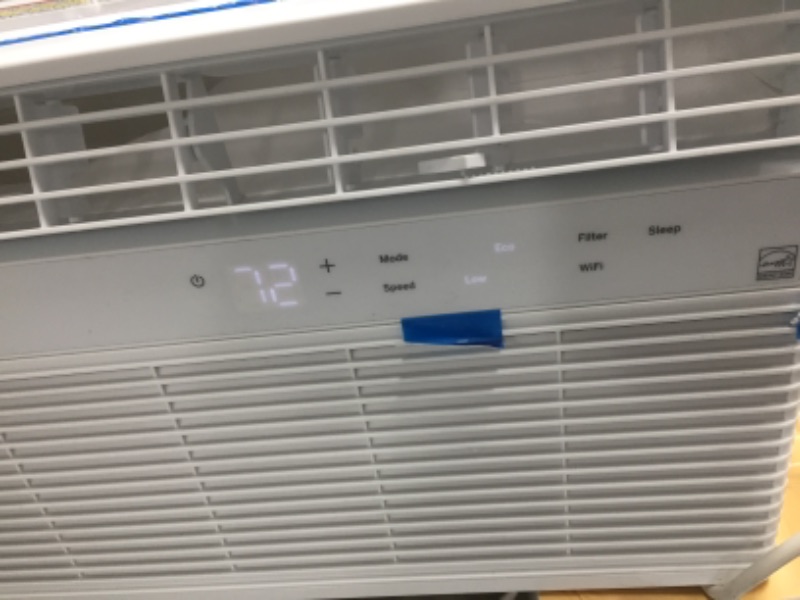 Photo 1 of  8,000 BTU 115-Volt Smart Window Air Conditioner with WiFi  in white *ground broken off*