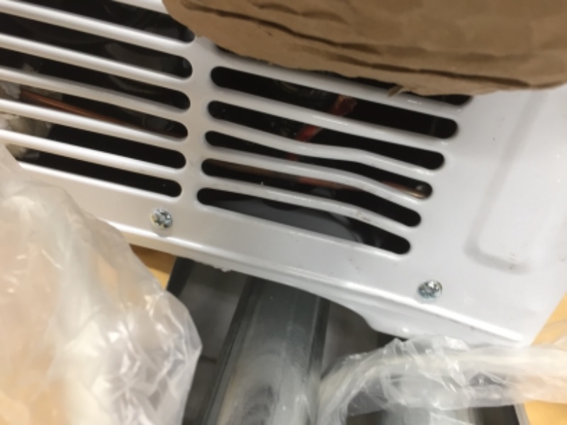Photo 9 of  8,000 BTU 115-Volt Smart Window Air Conditioner with WiFi  in white *ground broken off*