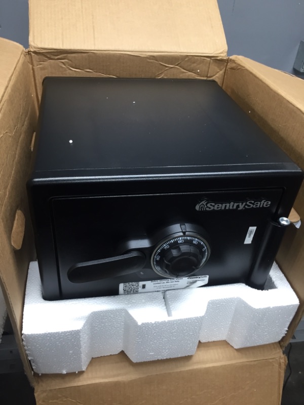 Photo 2 of *keys possibly inside item*
SentrySafe SFW082CTB Fireproof Safe and Waterproof Safe with Dial Combination 0.82 Cubic Feet, Black
DOES NOT OPEN 
