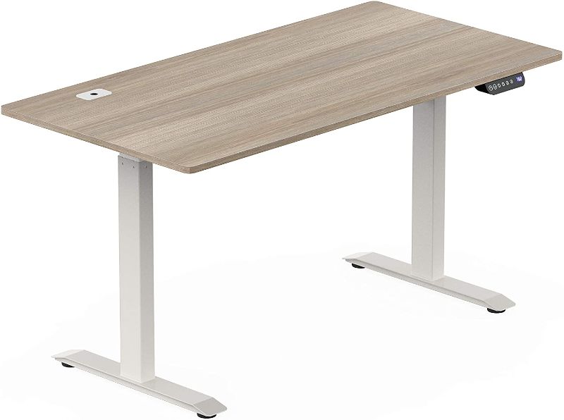 Photo 1 of SHW 55-Inch Large Electric Height Adjustable Standing Desk, 55 x 28 Inches, Oak
