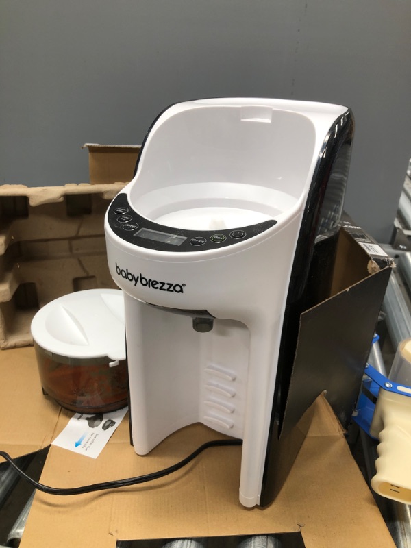 Photo 1 of New and Improved Baby Brezza Formula Pro Advanced Formula Dispenser Machine - Automatically Mix a Warm Formula Bottle Instantly - Easily Make Bottle with Automatic Powder Blending