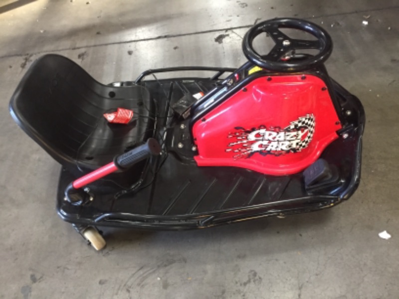 Photo 2 of DAMAGED STEERING WHEEL**
Razor Crazy Cart - 24V Electric Drifting Go Kart - Variable Speed, Up to 12 mph, Drift Bar for Controlled Drifts
