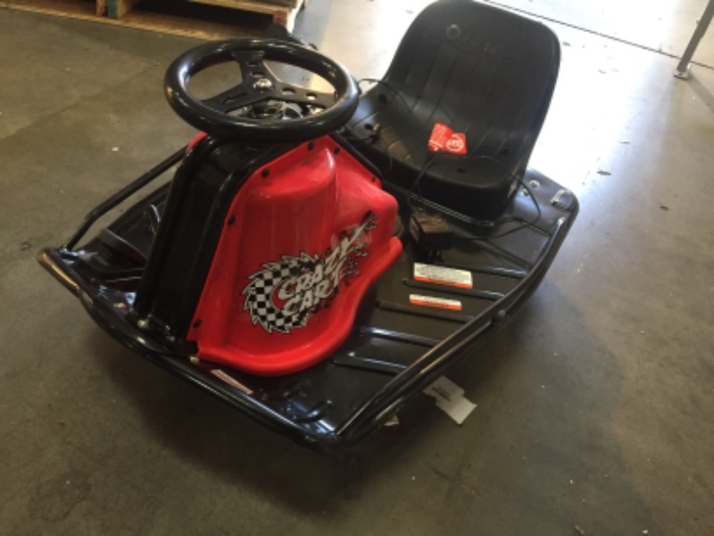 Photo 1 of DAMAGED STEERING WHEEL**
Razor Crazy Cart - 24V Electric Drifting Go Kart - Variable Speed, Up to 12 mph, Drift Bar for Controlled Drifts
