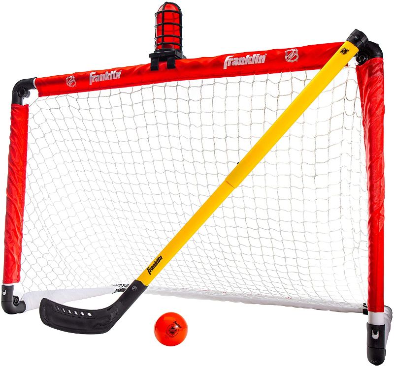 Photo 1 of Franklin Sports Mini Hockey Goal Set - NHL Light Up Knee Hockey Goal and Stick Set with Hockey Ball - Perfect for Indoor Floor Hockey and Knee Hockey