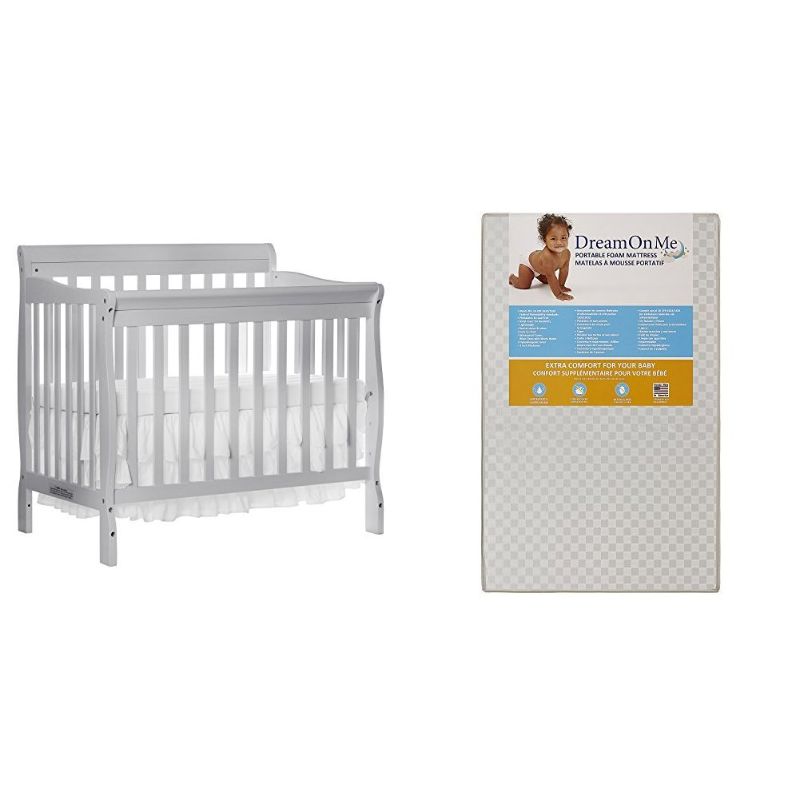 Photo 1 of Dream On Me 4 in 1 Aden Convertible Mini Crib with Dream On Me 3 Portable Crib Mattress, Grey
