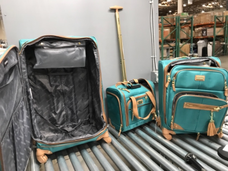 Photo 3 of **STAINS FROM PREVIOUS USE, THREAD IS LOOSE ON BOTTOM OF LARGE SUITCASE**
Steve Madden Designer Luggage Collection - 3 Piece Softside Expandable Lightweight Spinner Suitcase Set - Travel Set includes 20 Inch Carry on, 24 Inch & 28-Inch Checked Suitcases (