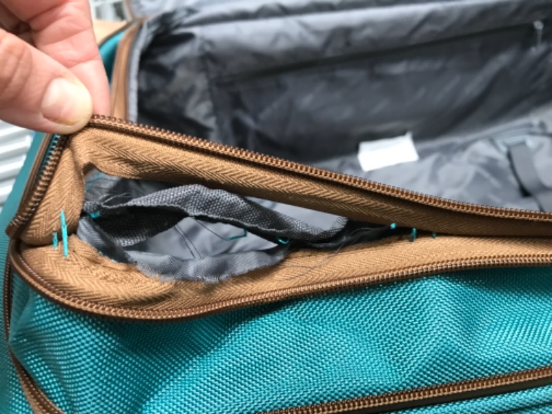 Photo 4 of **STAINS FROM PREVIOUS USE, THREAD IS LOOSE ON BOTTOM OF LARGE SUITCASE**
Steve Madden Designer Luggage Collection - 3 Piece Softside Expandable Lightweight Spinner Suitcase Set - Travel Set includes 20 Inch Carry on, 24 Inch & 28-Inch Checked Suitcases (