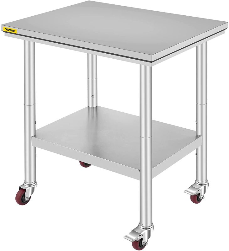 Photo 1 of **HAS DENTS**
 Stainless Steel Work Table with Wheels 24 x 30 Prep Table with casters Heavy Duty Work Table for Commercial Kitchen Restaurant Business 
