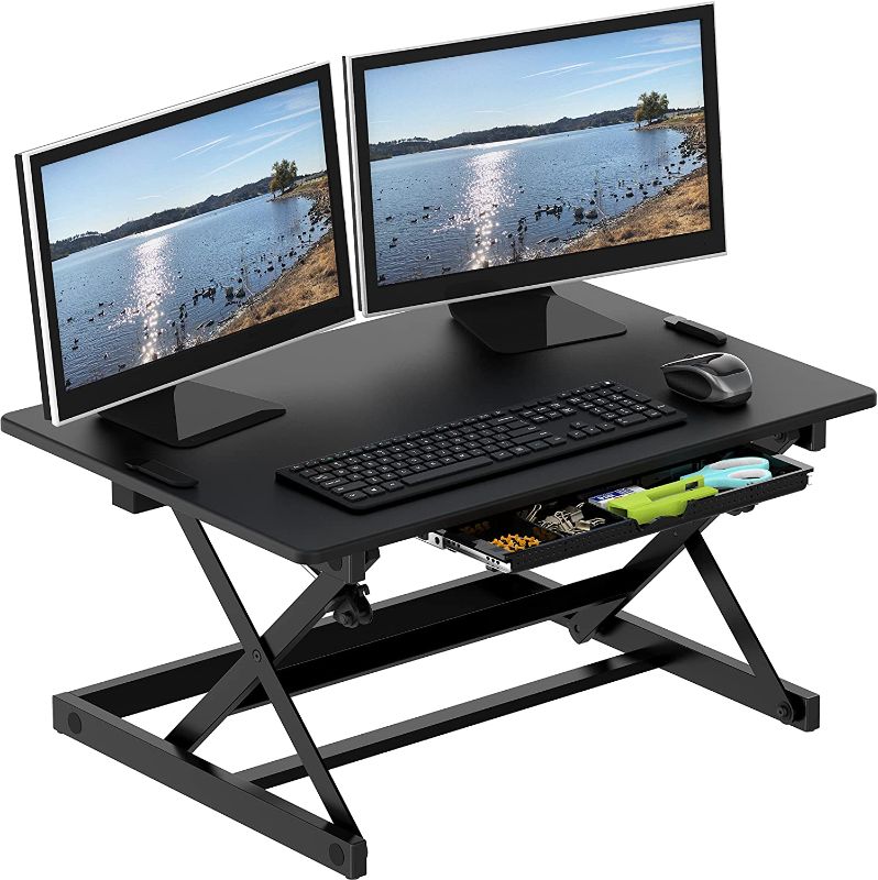 Photo 1 of SHW 32-Inch Height Adjustable Standing Desk Converter Riser Workstation, Black