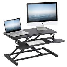 Photo 1 of FITUEYES Standing Desk Ergonomic Height Adjustable Desktop Workstation Desk Converter SD308001WB
