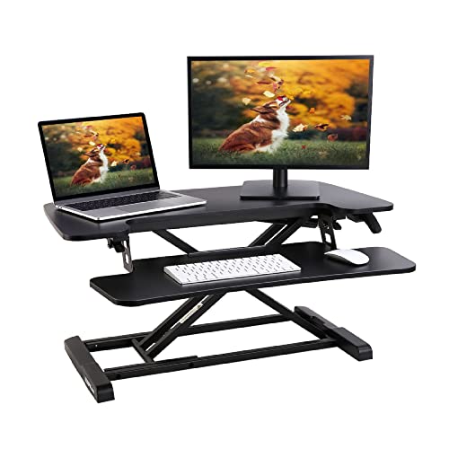 Photo 1 of ***DAMAGE SHOWN IN PICTURE***   FLEXISPOT 32 Inch Standing Desk Converter | Height Adjustable Stand up Desk Riser, Black Home Office Desk Workstation for Dual Monitors and Laptop M73
