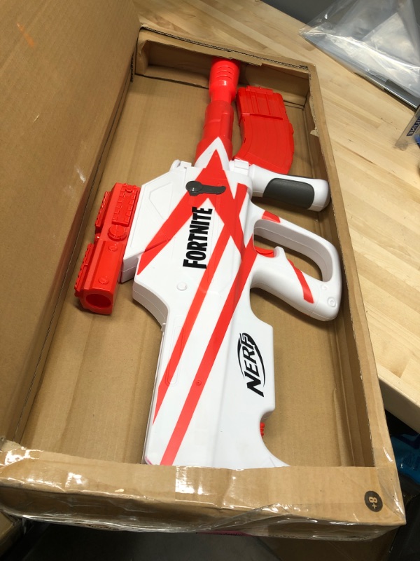 Photo 2 of **INCOMPLETE**
NERF Fortnite B-AR Motorized Dart Blaster -- Fortnite Converge Wrap, Motorized 10-Dart Blasting, 10-Dart Clip, 10 Official Elite Darts
