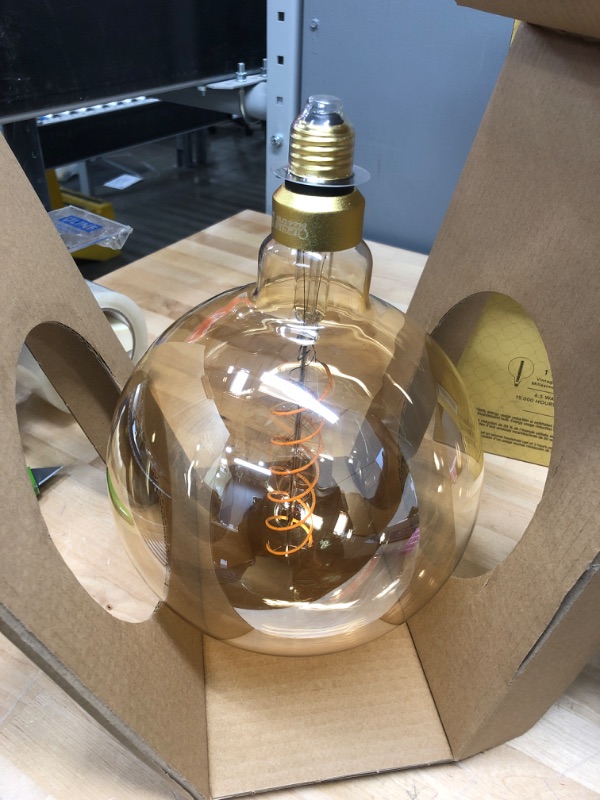 Photo 2 of 60-Watt Equivalent G63 Dimmable Spiral Filament Oversized Amber Glass E26 Vintage Edison LED Light Bulb, Warm White
