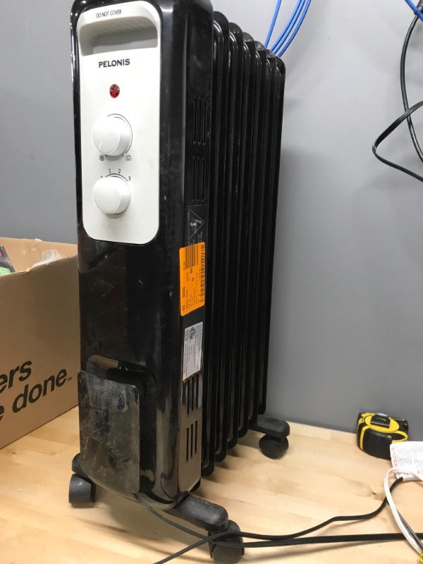 Photo 1 of 1,500-Watt Oil-Filled Radiant Electric Space Heater with Thermostat
