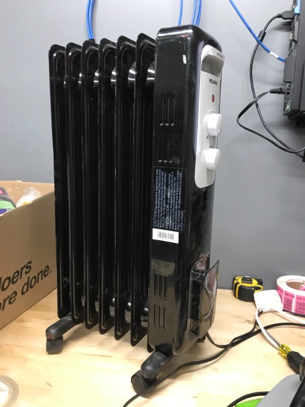 Photo 1 of 1,500-Watt Oil-Filled Radiant Electric Space Heater with Thermostat
