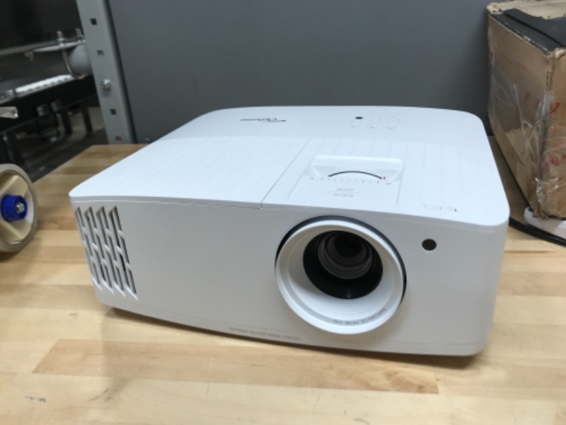 Photo 2 of PARTS ONLY* LIGHT FLASHES BUT NO LIGHT*
Optoma HD28HDR 1080p Home Theater Projector for Gaming and Movies | Support for 4K Input | HDR Compatible | 120Hz refresh rate | Enhanced Gaming Mode, 8.4ms Response Time | High-Bright 3600 lumens
