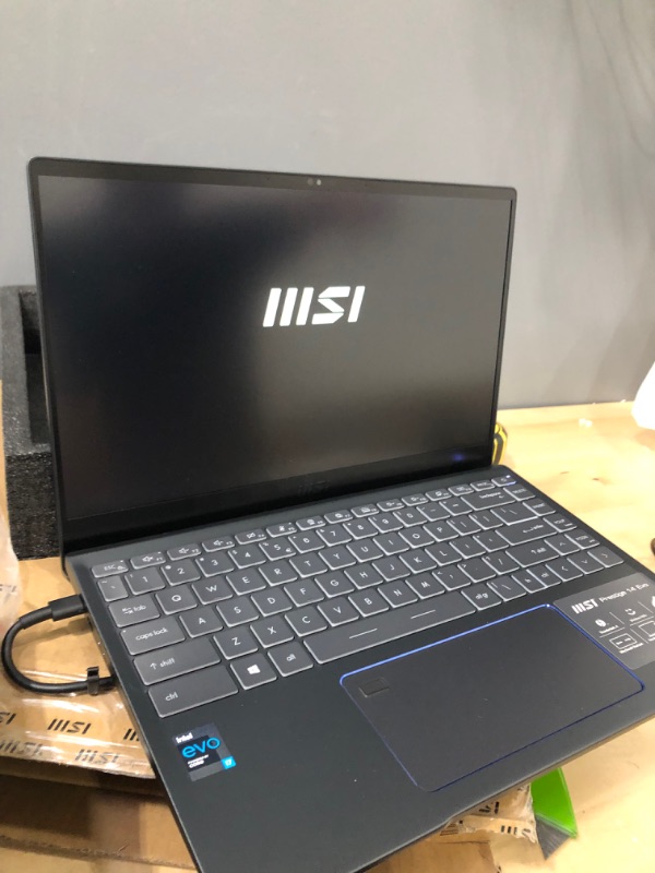 Photo 4 of MSI Prestige 14 Evo Professional Laptop: 14" FHD Ultra-Thin Bezel Display, Intel Core i7-1185G7, Intel Iris Xe, 16GB RAM, 512GB NVMe SSD, Thunderbolt 4, Win10 Home, Intel Evo, Carbon Gray (A11M-220)
