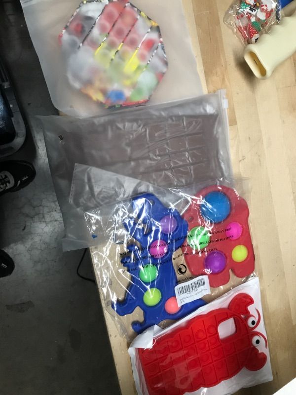 Photo 1 of Kids Toy Bundle & iPhone 12 Pro Case 
SOLD AS IS/NO REFUNDS/NO RETURNS