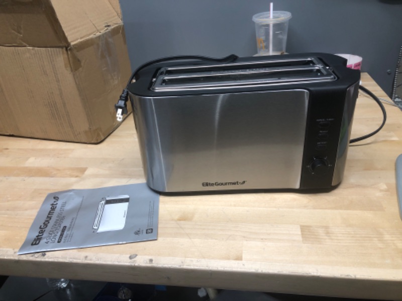 Photo 2 of **PARTS ONLY** NOT FUNCTIONAL
Elite Gourmet ECT-3100 Long Slot Toaster, Reheat, 6 Toast Settings, Defrost, Cancel Functions, Slide Out Crumb Tray, Extra Wide Slots for Bagels Waffles
