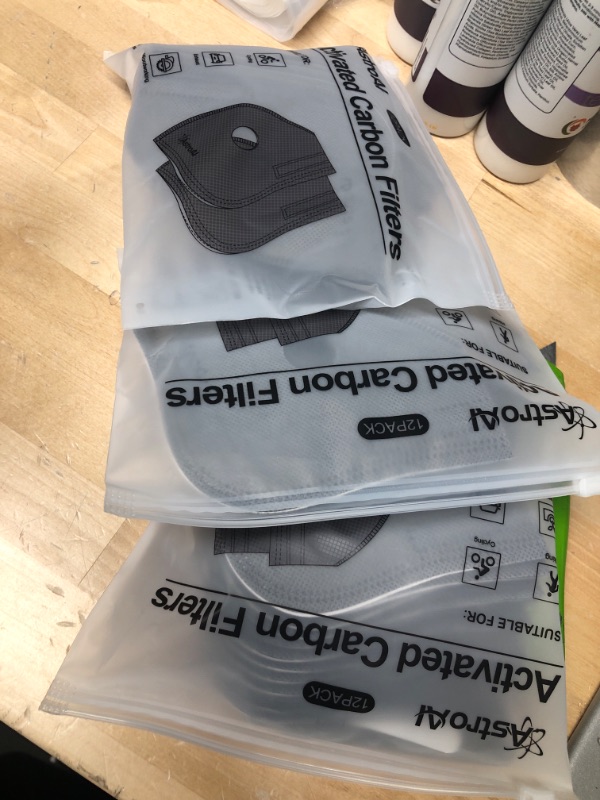 Photo 2 of **PACK OF 3**
AstroAI 12 Pieces Activated Carbon Filters for Reusable Dust Face Mask, with Another 4 Breathing Valves and 12 Nose Pads, Fitting for AstroAI Plus Face Dust Mask
