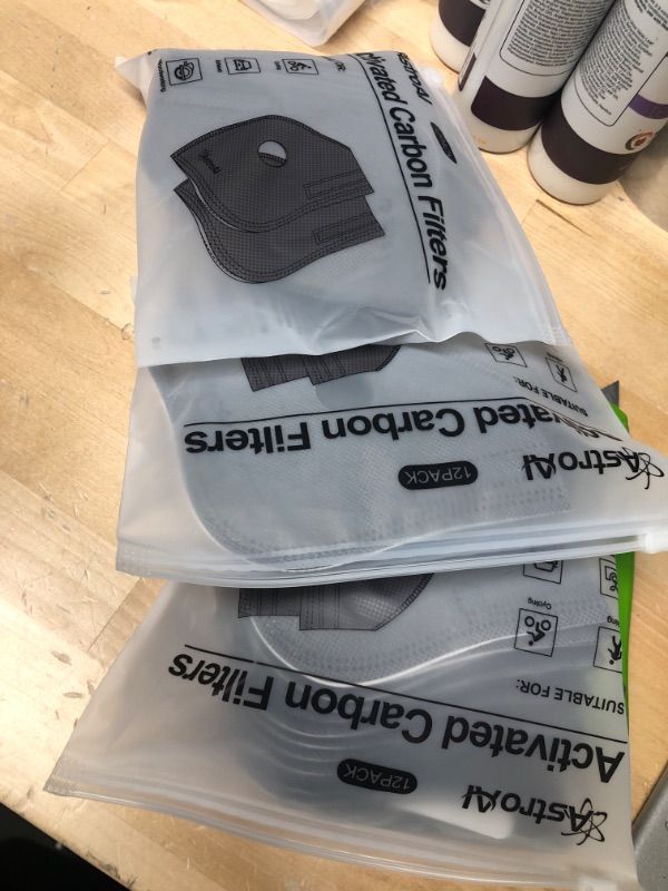 Photo 2 of **PACK OF 3**
AstroAI 12 Pieces Activated Carbon Filters for Reusable Dust Face Mask, with Another 4 Breathing Valves and 12 Nose Pads, Fitting for AstroAI Plus Face Dust Mask