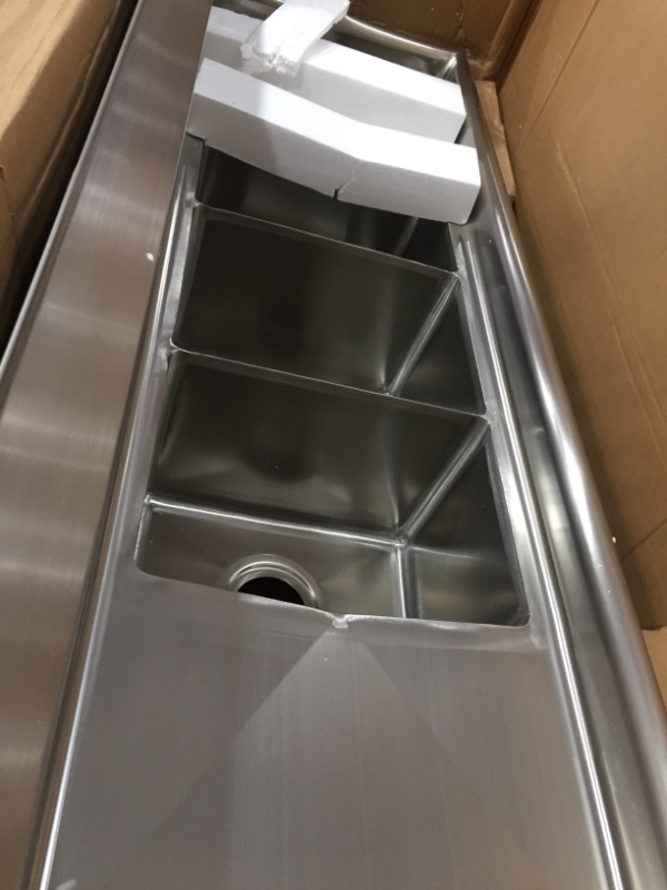 Photo 4 of ***MINOR DAMAGE***
SC101410-12B3 3 Compartment Stainless Steel Nsf Commercial Kitchen Sink with Right and Left Drainboards - Bowl Size 10" X 14" X 10"
