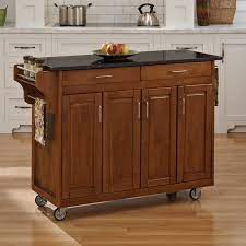 Photo 1 of ***INCOMPLETS JUST THE CART NO TOP!**** ONLY BOX 1*** MISSING BOX 2****
Warm Oak Kitchen Cart with Cherry Wood Top
by HOMESTYLES
Shop the Collection