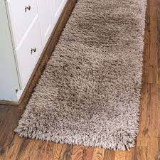 Photo 1 of *** STOCK PHOTO FOR REFERENCE *** BROWN SHAG RUNNER 2'7 X 8 FT