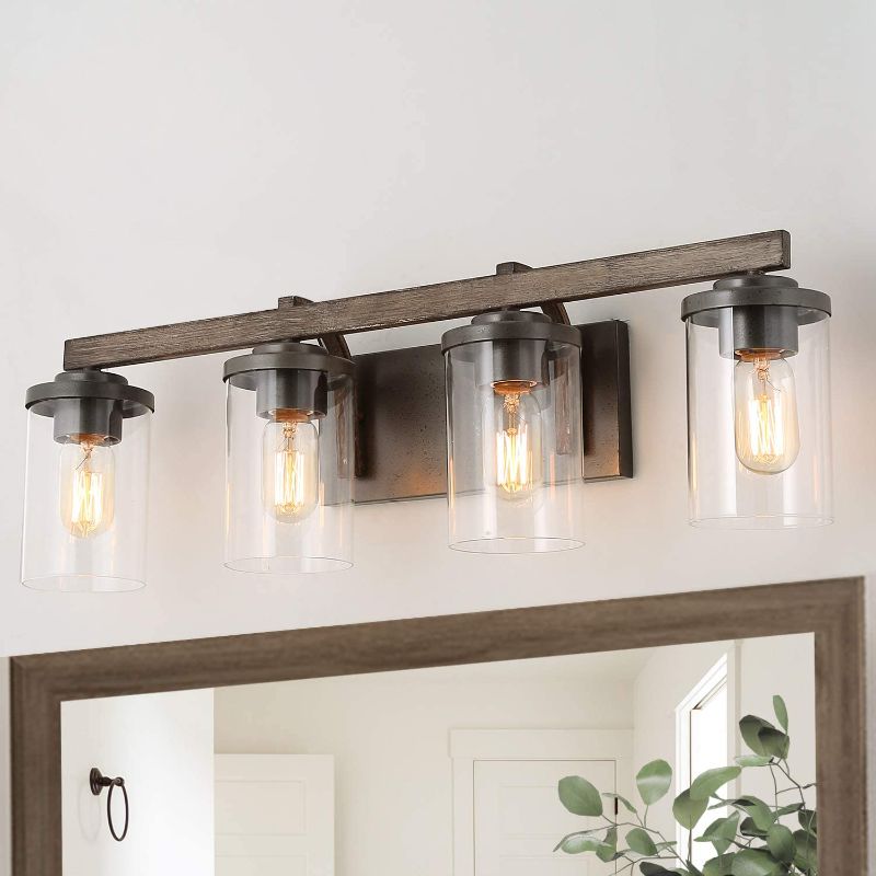 Photo 1 of LALUZ Bathroom Vanity Light Fixtures, Farmhouse Vanity Lighting with Clear Glass Shades, Faux Wood, 4-Light, 28’’ L x 6.3’’ W x 8.7’’ H
