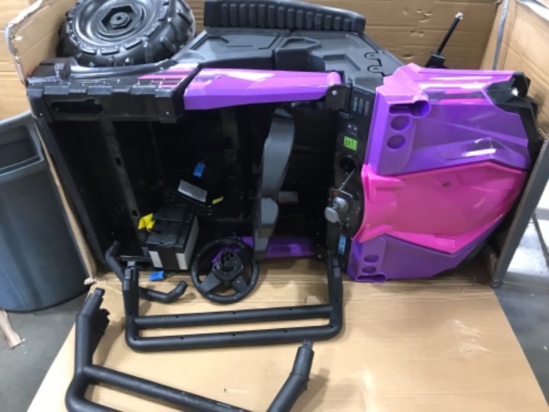 Photo 2 of ***PARTS ONLY*** Kid Trax UTV Toddler/Kids Electric Ride On Toy, 12 Volt, 3-7 yrs Old, Max Weight 110 lbs, Single or Double Riders, Purple
