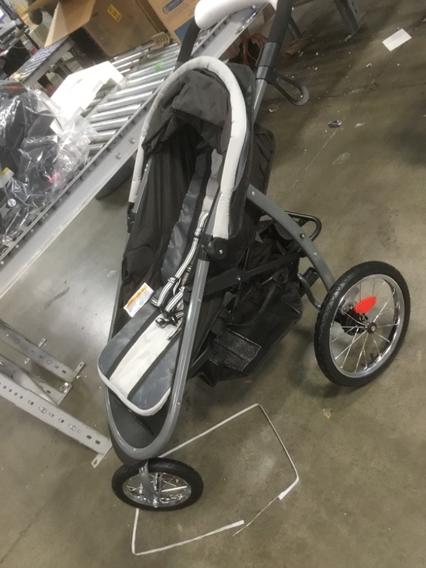 Photo 7 of Graco FastAction Fold Jogger Travel System | Includes the FastAction Fold Jogging Stroller and SnugRide 35 Infant Car Seat, Gotham
