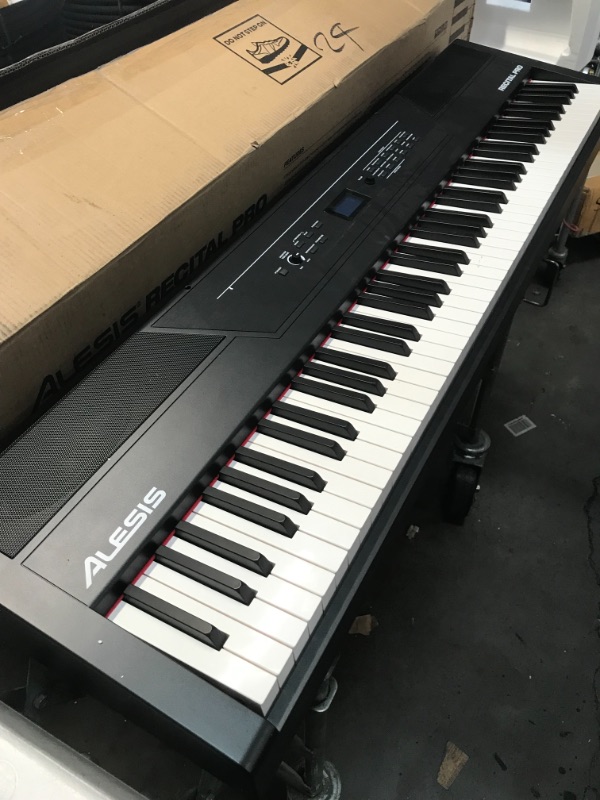 Photo 2 of *USED*
Alesis Recital Pro - 88 Key Digital Piano Keyboard with Hammer Action Weighted Keys, 2x20W Speakers, 12 Voices, Record and Lesson Mode, FX and Display
