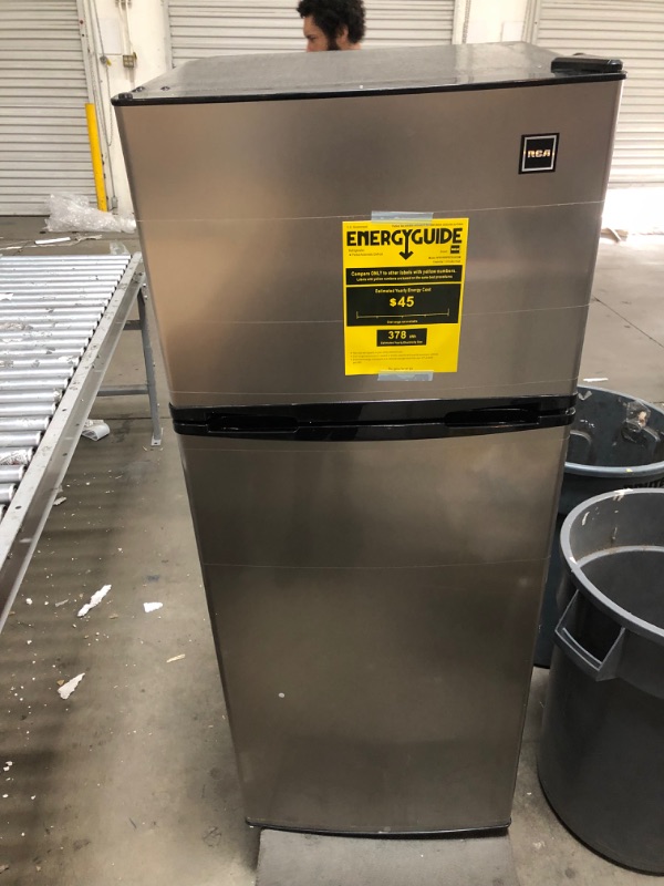 Photo 1 of *SEE last picture for damage*
RCA RFR725 EFR749 2 Door Apartment Size Refrigerator with Freezer, 7.5 cu. ft, Platinum, Stainless
