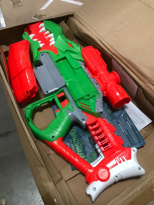 Photo 2 of *USED*
*MISSING 2 darts*
NERF DinoSquad Rex-Rampage Motorized Dart Blaster, 10-Dart Clip, 20 Official Darts, 10-Dart Storage- T-Rex Dinosaur Design