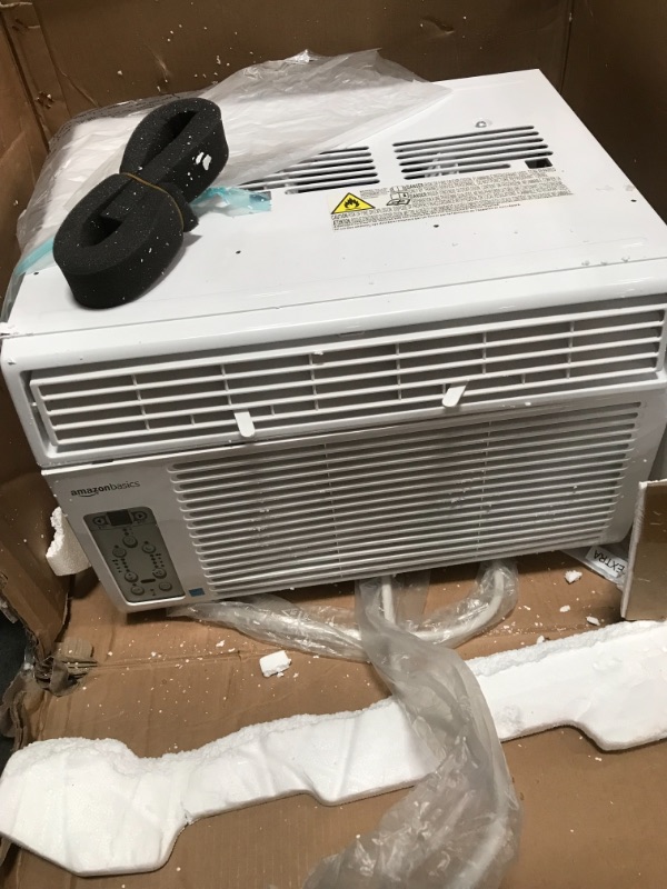 Photo 2 of *USED*
*MISSING remote, manual and other components* 
Amazon Basics Window-Mounted Air Conditioner with Remote - Cools 350 square feet, 8,000 BTU
