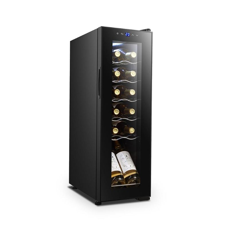 Photo 1 of *SEE last pictures for damage*
Nutrichef PKCWC120 Refrigerator-Freestanding Compact Mini Wine Fridge 12 Bottle Capacity, Digital Control, Glass Door, Black