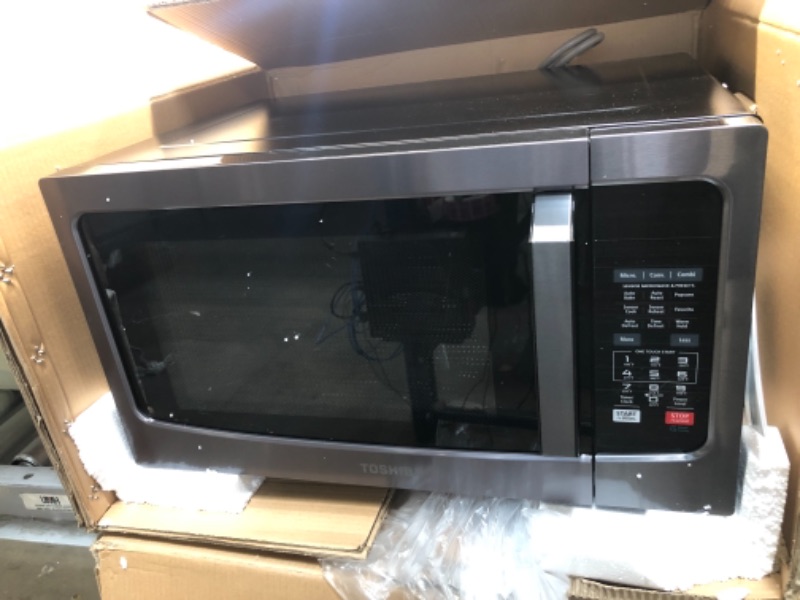 Photo 3 of DENTED* TESTED TURNS ON**
Toshiba EM131A5C-SS Microwave Oven with Smart Sensor, Easy Clean Interior, ECO Mode and Sound On/Off, 1.2 Cu Ft, Stainless Steel
