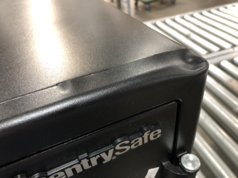 Photo 4 of (DENTED TOP)
SentrySafe SFW123CU Fireproof Safe and Waterproof Safe with Dial Combination 1.23 Cubic Feet