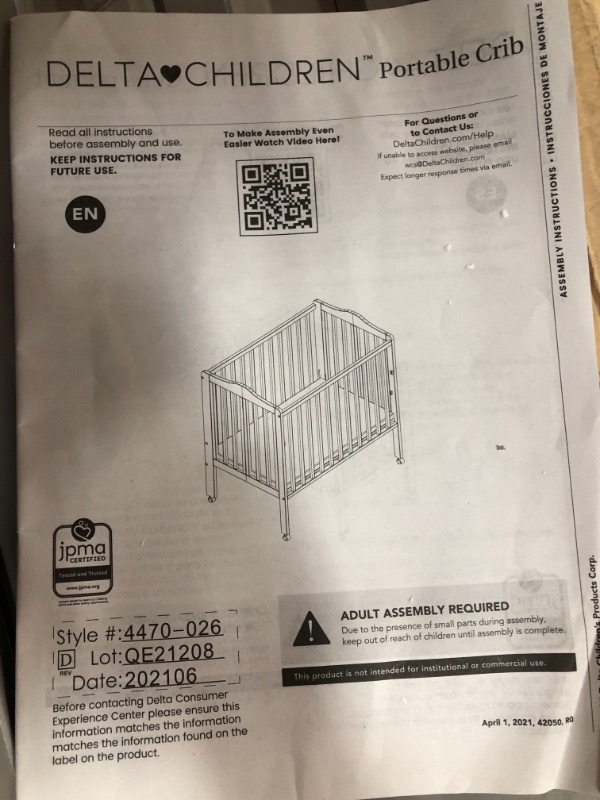 Photo 2 of Delta Children Folding Portable Crib with Mattress Grey